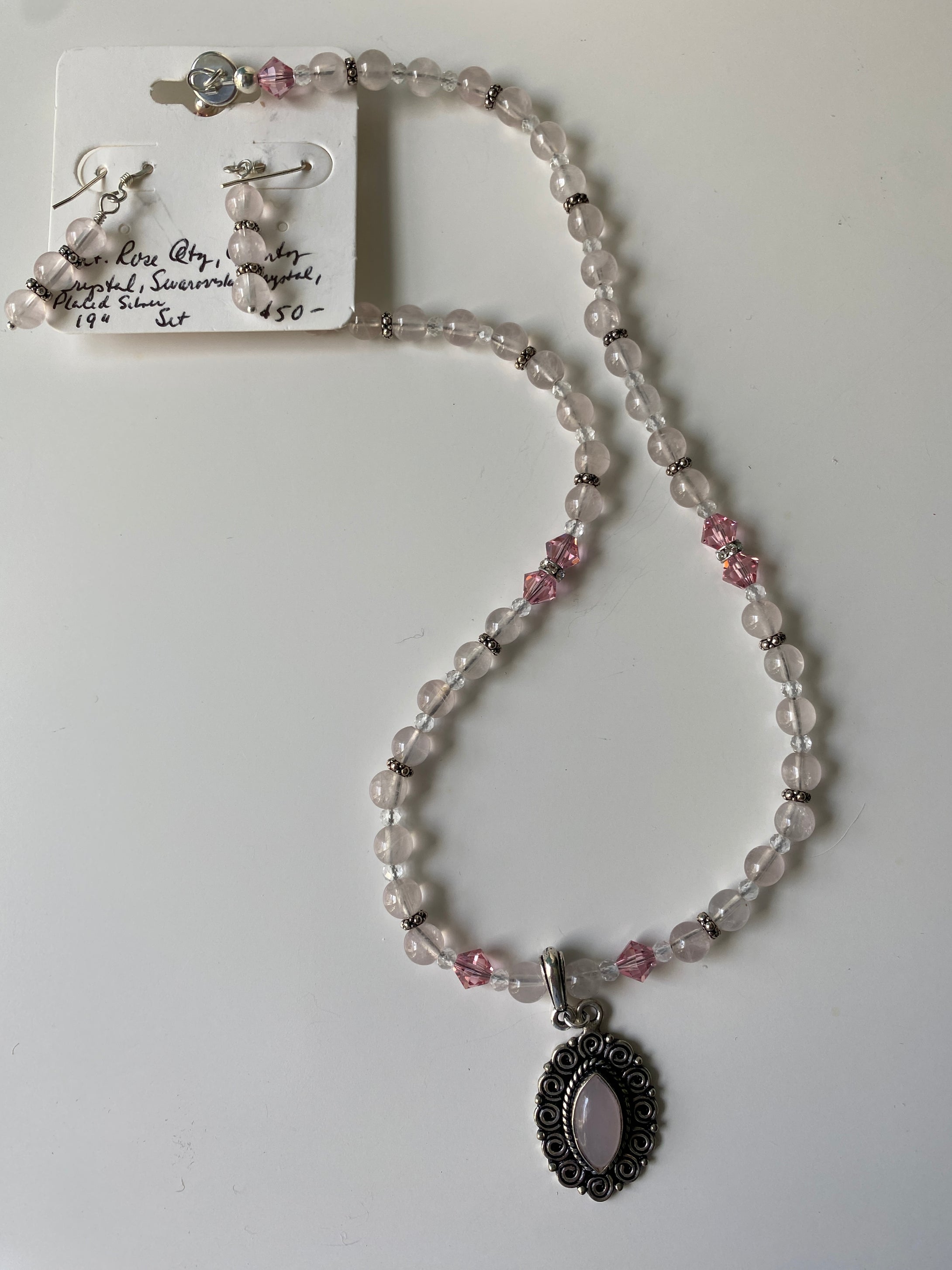 Natural Rose Quartz, quartz Crystal, Swarovski Crystal & plated silver  necklace and earring set 19”