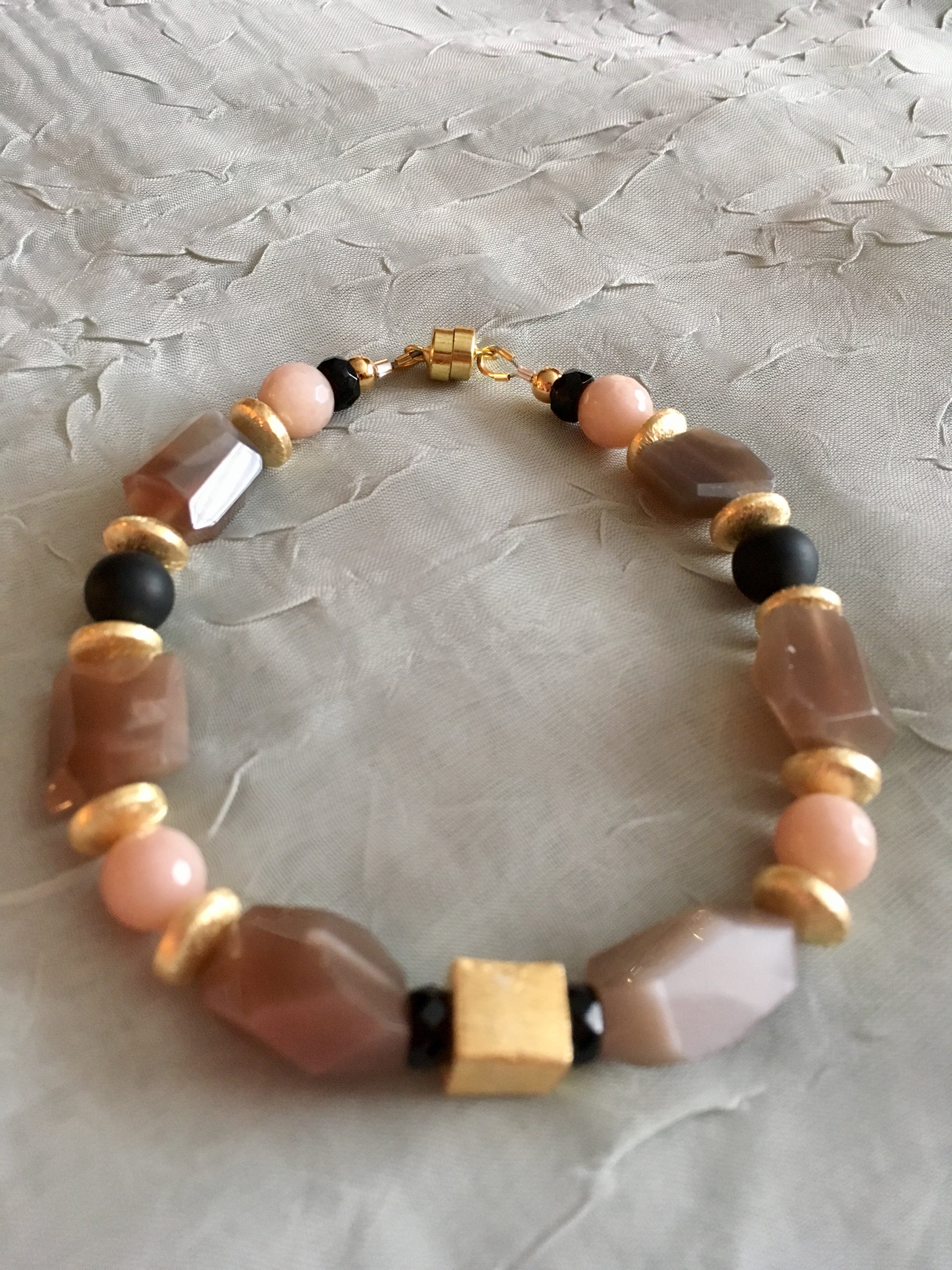 Fac. Peach Moonstone Nuggets, Black Onyx, Brushed Plated Gold.  Bracelet. 8 3/4