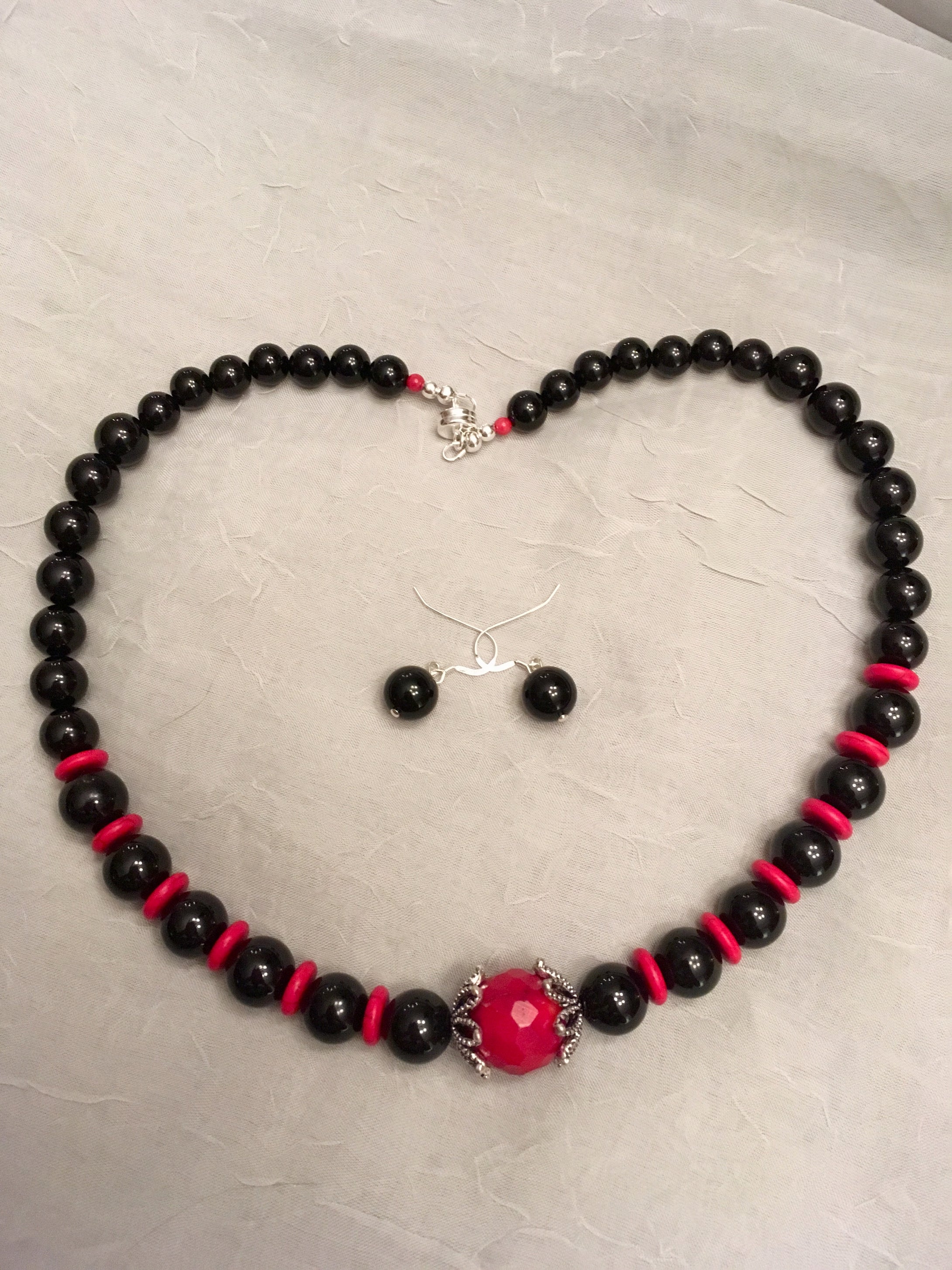 Graduated Black Onyx, Coral, Plated Silver.  19 1/2