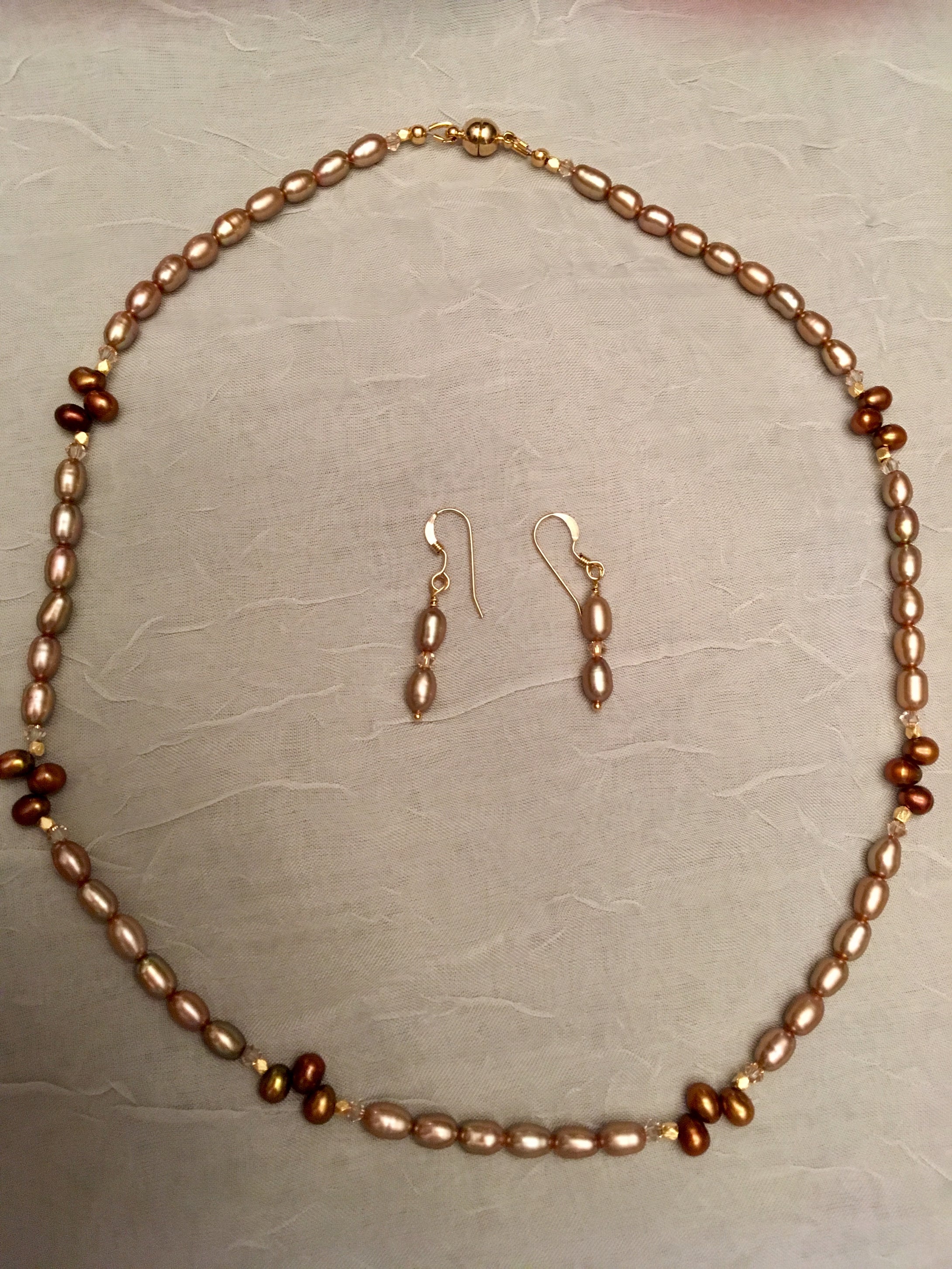 Freshwater Gold Rice Pearls, Bronze Dancing Pearls, Swarovski Crystals.  18