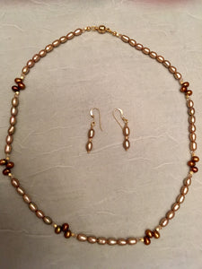 Freshwater Gold Rice Pearls, Bronze Dancing Pearls, Swarovski Crystals.  18"