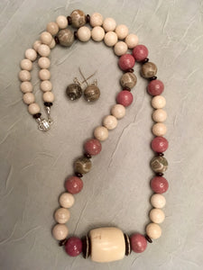 Fossil Coral, Rhodonite, Riverstone, & Wood.  25"