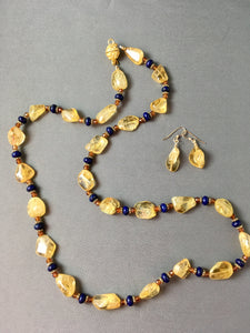 Citrine, Lapis, Hessonite and Plated Gold.  27"