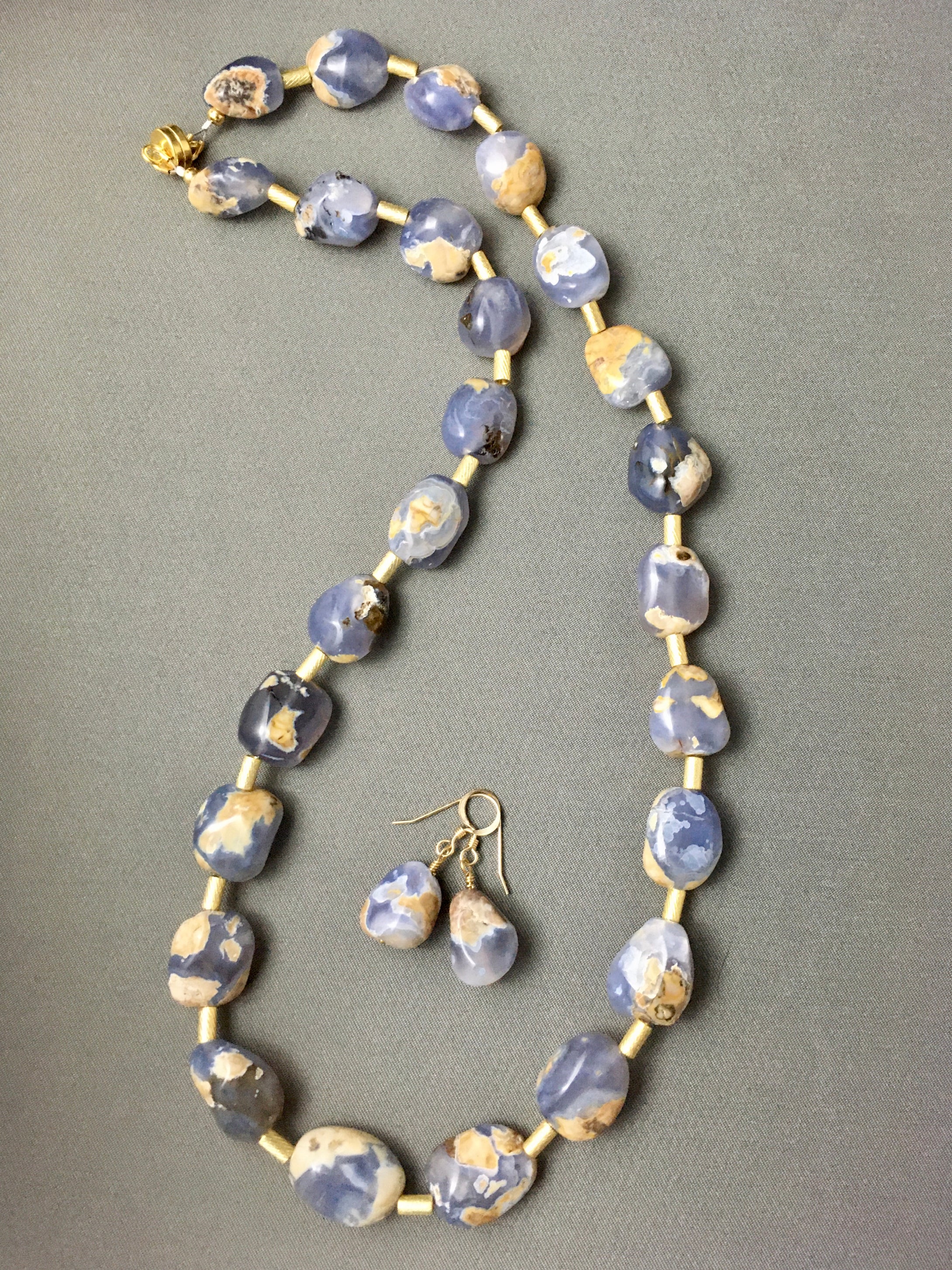 Egg Shell Chalcedony and Brushed Plated Gold Tubes.  21