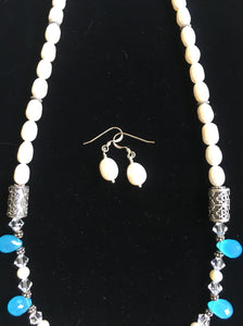 Blue Chalcedony, FW Pearls, Swarovski Crystals, Bali & Sterling Silver.  22"